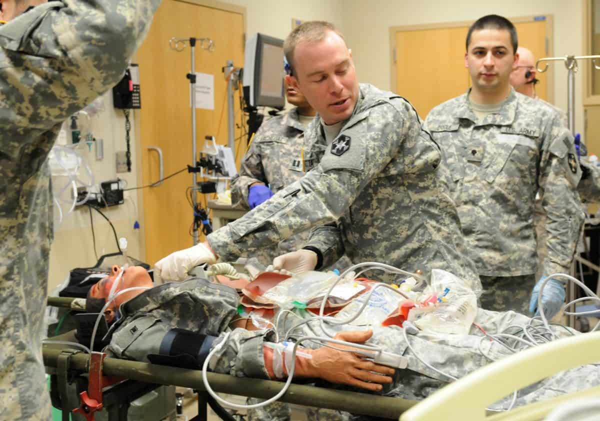 Military medics in simulation room